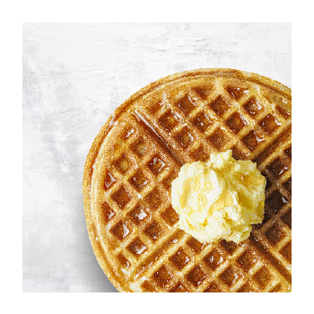 Image of waffle with syrup and a dollop of butter
