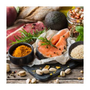 Image of raw fish, nuts, and avocadoes  