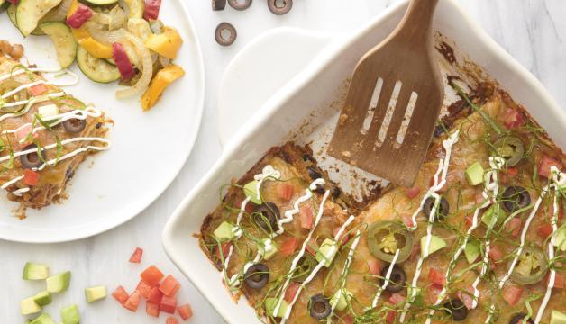 Natural Grocers Vegetarian Enchilada Casserole with Sautéed Onions, Peppers, and Zucchini  