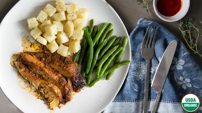 Natural Grocers Organic Slow Cooker Cajun Spiced Chicken Served with Potatoes and Green Beans